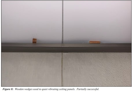 wooden wedges used to quiet vibrating ceiling panels, partially successful 