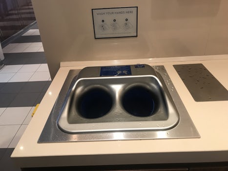 Hands free hand washer in dining room