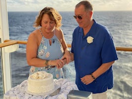 Cutting our vow renewel cake after ceremony. Private ceremony on Waterfront