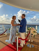 Our private vow renewl ceremony on deck 8 aft on the Waterfront.