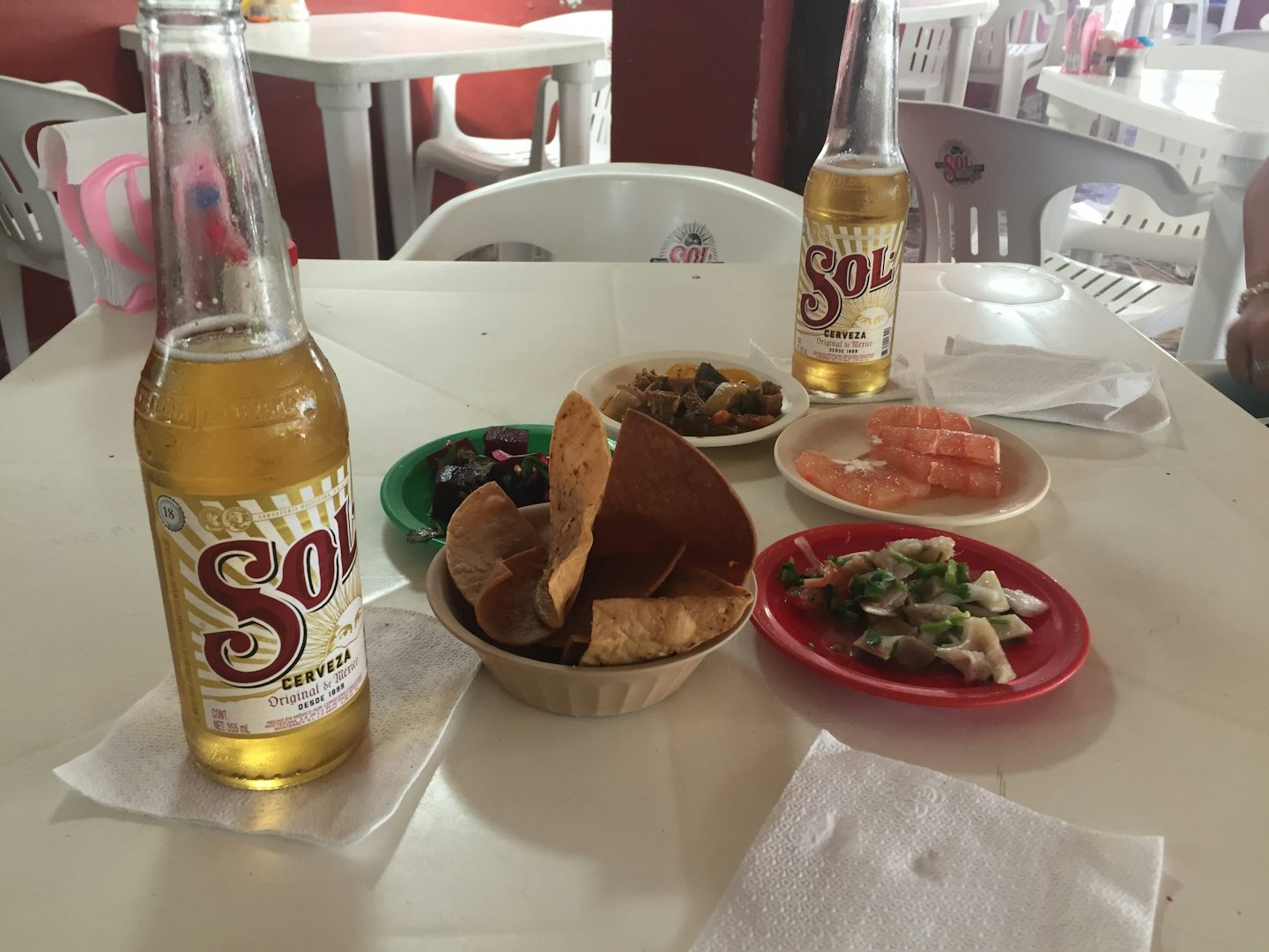 Cozumel, in town at a cantina , El Gato Negro, cerveza and botanas