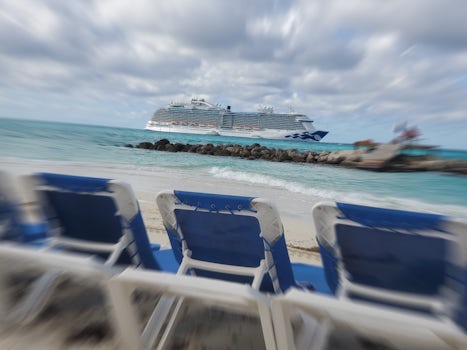 View of anchored ship from beach at Princess Cays.