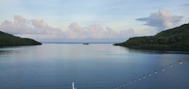 Departing Huahine, French Polynesia bay and lagoon at sunset