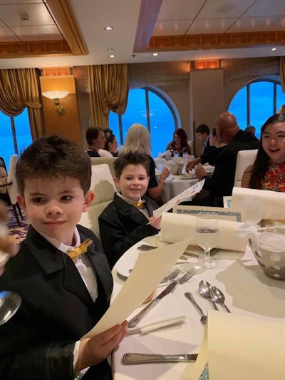 My boys in their tuxes in the main dining room just before the waiter threw