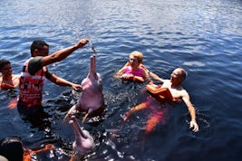 swimming with free pink dolphins, Manaus
