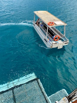 "Glassy" (Glass bottomed boat) returning to the back deck lift