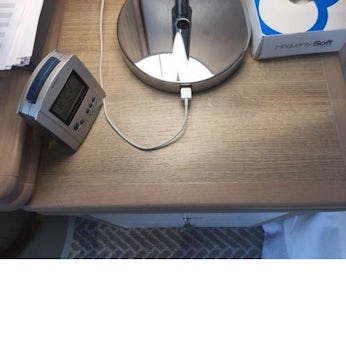 One USB charging outlet on both lamps bed side.