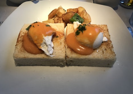 Fruits de Mer: scallops and shrimp on toasted brioche with a poached egg an