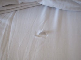 Some of the tears in the sheets