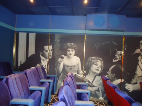 Mural on movie theatre wall-check what movie is showing-a different one eac