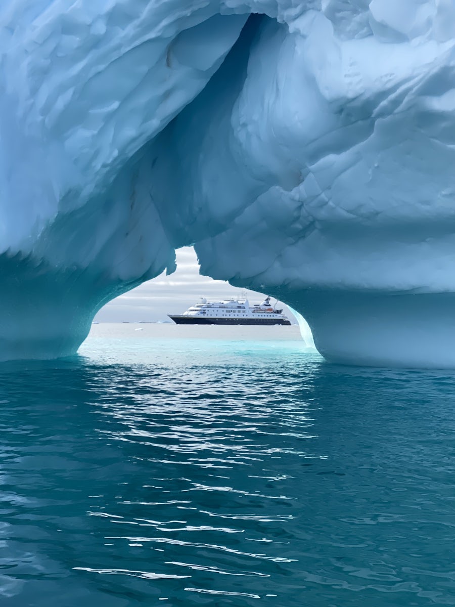 Orion behind iceberg 