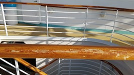 Banisters worn to bare wood throughout the ship 