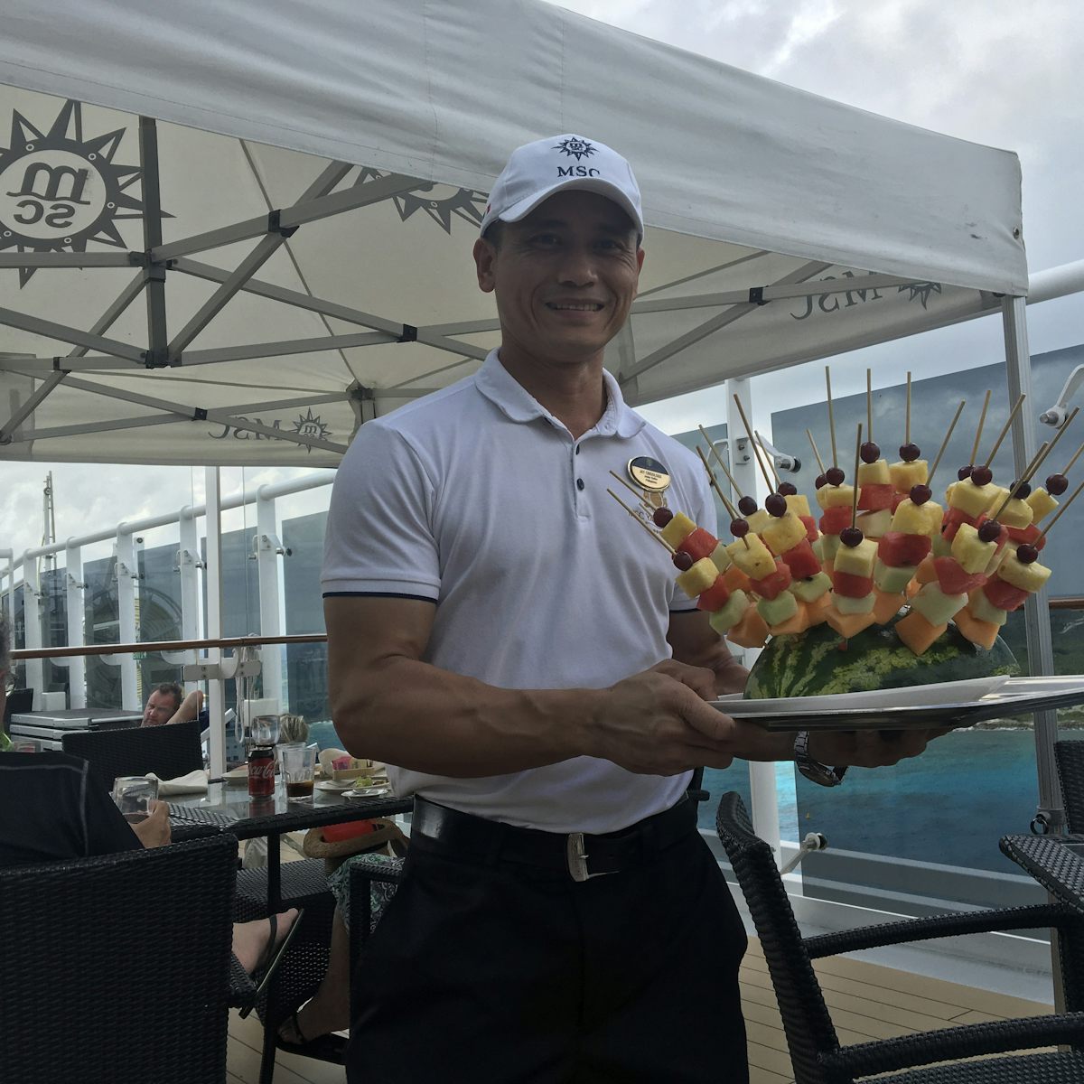 Skewers of fruit offered by butler at One Pool