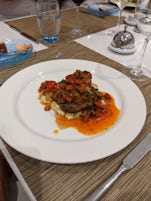 Beef Filet Mignon with leek-goat cheese fondue, chorizo salsa from the Fren