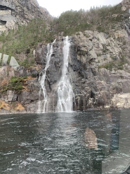 Huge waterfall in the Lysefjord on the Pulpit Rock Cruise from Stavenger