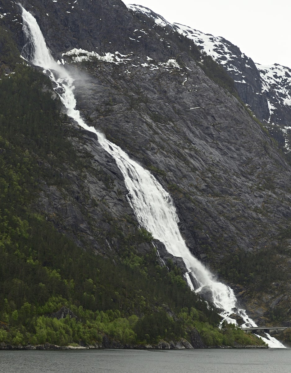 Lang Fossen waterfall, cleaned up in post production, removed mist and saturated colours. 
