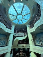 The glass bottom of the main pool is the ceiling over the atrium and main dining room