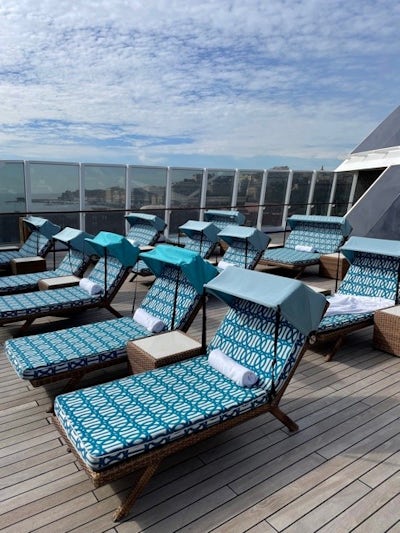 For those in Penthouses and above you have complimentary access to the Spa Terrace.  The loungers have been upgraded during the Oceania Next program