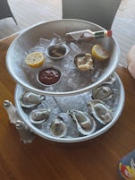 Beautiful presentation of a dozen raw oysters from the Seafood Shack.  Expensive at $24/doz but a fun and tasty splurge.