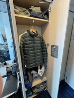One of two closets. Shelves made it easy to store clothes. Tip: use packing cubes