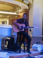 James Naldo performing in the Piazza.  Wonderful way to take a break midday with entertainment in a beautiful atmosphere 