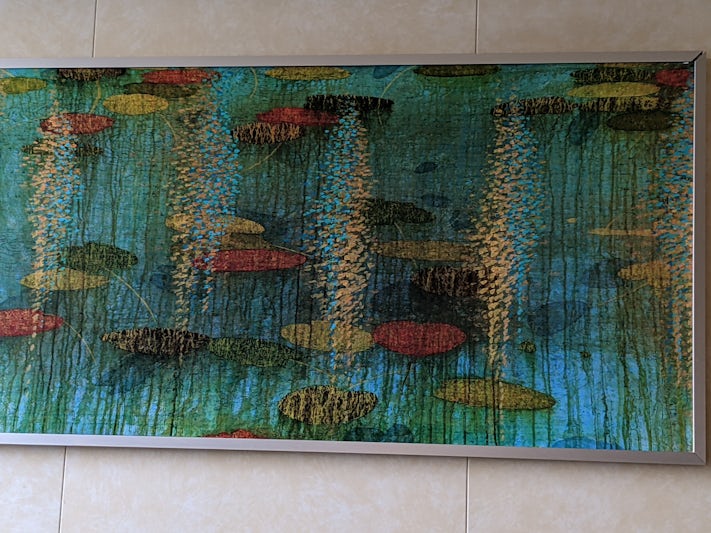This was the painting in our balcony room...we couldn't decide if those were fish or lily pads? You decide...our rooms comforters and things were very dated.