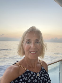 This is a photo of me, standing out on our veranda on the celebrity equinox. It was wonderful!