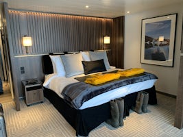 Penthouse Suite.  Complementary arctic parkas are on the bed. 