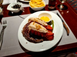 Bayou Café 395g rib eye and lobster 