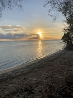 a sunset on a Motu off Bora Bora