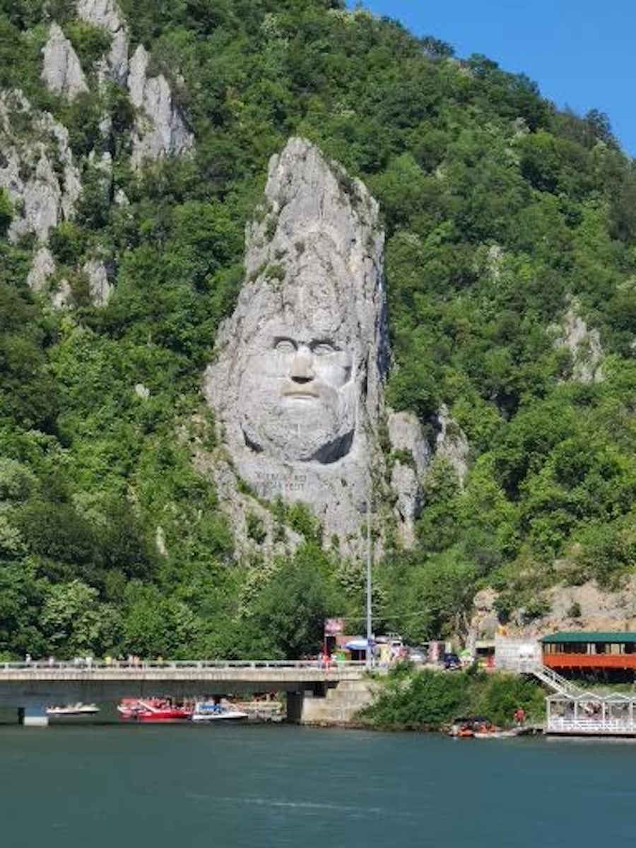 Traveling in gorge upriver from Iron Gates.  Giant stone carving of Dacian Emperor