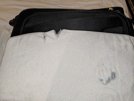 Bath towel with rip and hole