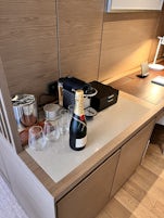The bar area of the suite - a fully stocked fridge below.  