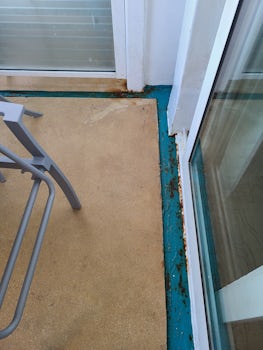 Rust and standing water on the balcony