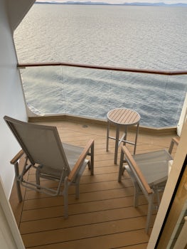 Cabin 1403 larger balcony deck 10. Extends around 3 foot larger into corner. Nice size for lounger and footstool