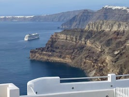 NCL Getaway anchored off the coast of Oia, Greece. Photo taken from winery.