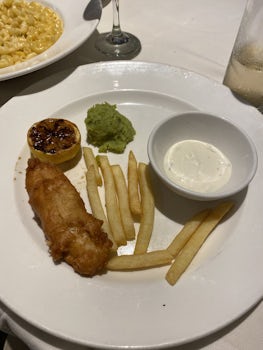 Again, taken as soon as it was placed in front of my daughter. It looks like someone ate half of it already. If a baby can count how many fries are on the plate, there aren’t enough of them. I can’t remember if this was chicken or fish but it was sad and small. 