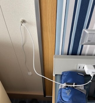 We used small magnets to help keep charging cords off night tables when not in use.