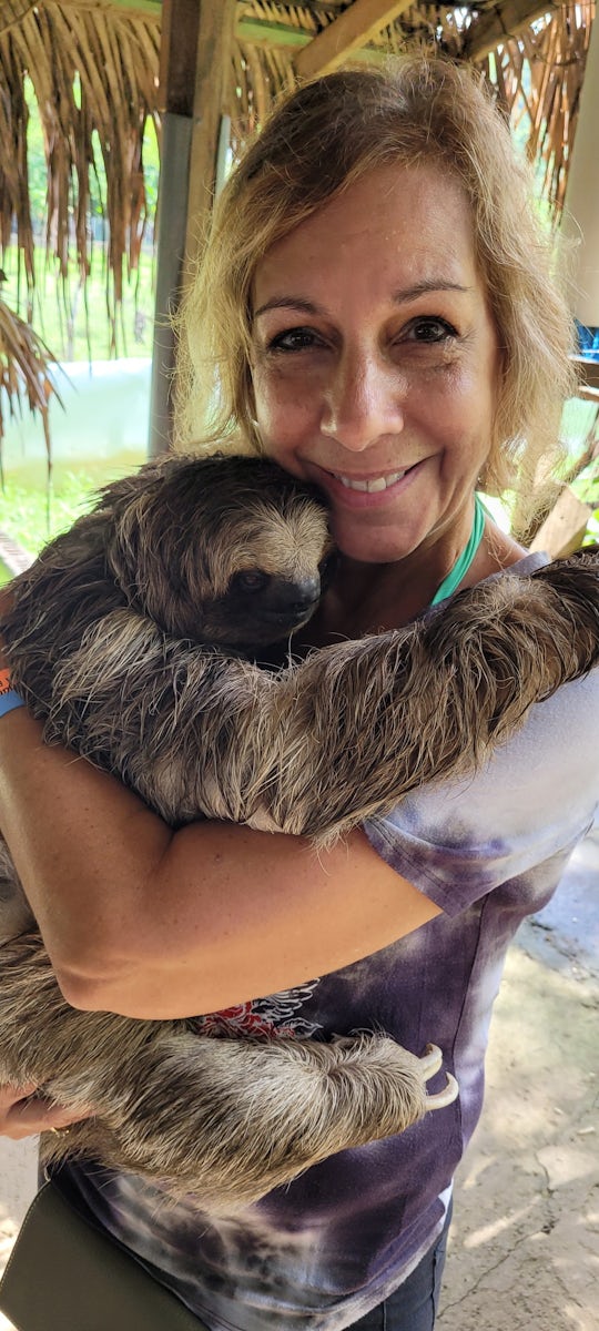 I was holding a pregnant sloth!  She was amazing!