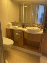 Shower was great, lots of small storage areas in washroom; appreciated robes provided,