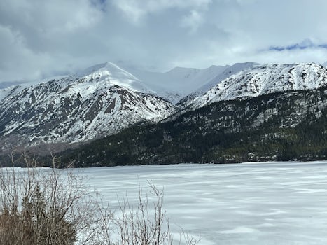 Frozen lake and mountains between Skagway and Carcross Yukon Territory.