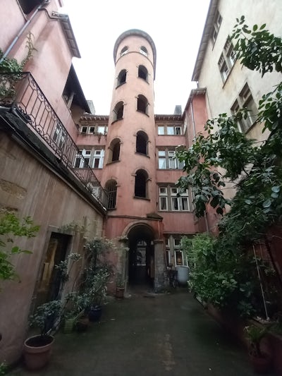 The staircase tower of Maison du Crible (“The House of the Sieve”), more commonly known as La Tour Rose ("The Pink Tower"), built in the 16th century, reportedly by the Italian architect Sebastiano Serlio of Bologna (as seen from the courtyard on the walking tour of Lyon)